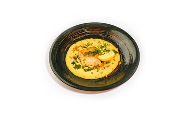Pan-Seared Salmon Fillet on Creamy Polenta with Lemon, Crispy Shallots, and Microgreens in a Rustic Ceramic Bowl