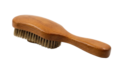 Wooden handle brush with metal bristles for cleaning shoes and materials isolated on black background