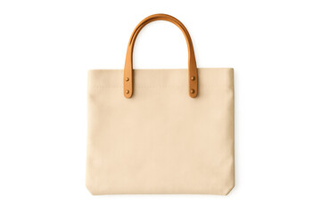 Beige canvas tote bag showcasing eco-friendly fashion accessory with leather handles, empty space for branding, transparent background