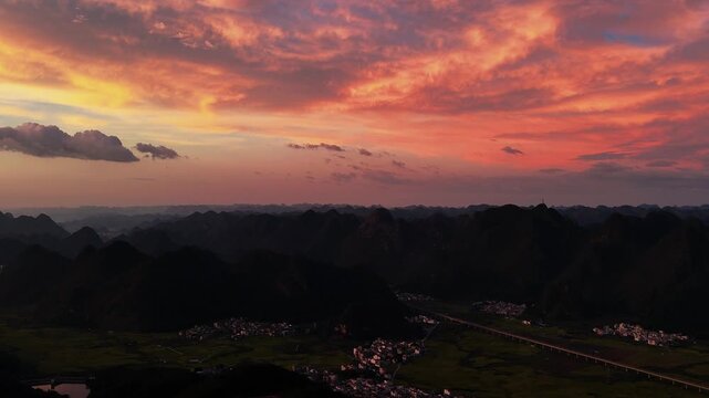 The Sky is on Fire: Typhoon-Fueled Cumulonimbus Ignited by the Setting Sun, Aerial Shot