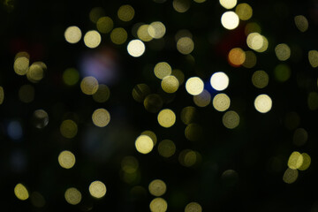 Obraz premium Real photograph taken bokeh blurry Christmas Xmas ornaments lights decoration dark night background