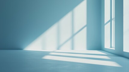 Obraz premium A blue room with a large window casting shadows on the walls.