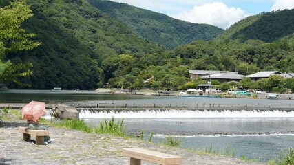 The river running out from the valley with the mountains as background