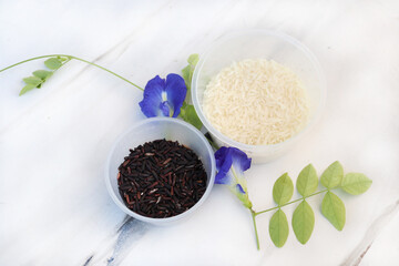 white rice and brown rice berry for health care arrangement flat lay style on background white 
