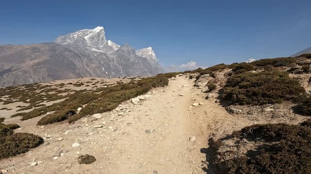 The landscape in Sagarmatha national park while trekking on the way from Dingboche village to Lobuche village in Nepal.