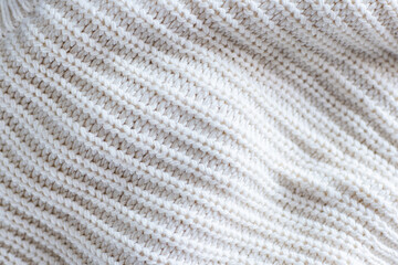 Close-up of textured white knitted fabric with diagonal pattern. Trendy color of 2026 year © Алина Бузунова