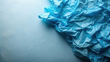 Fototapeta premium Abstract Draped Light Blue Fabric Texture Background Featuring Soft, Wrinkled Creases and Folds