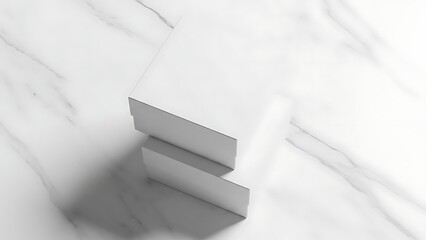 Minimalist white business cards on marble surface with shadow