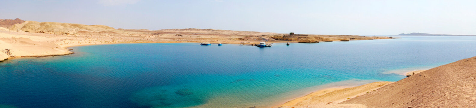 National park Ras Mohammed in Egypt. beautiful seaside with a sandy beach. Landscape with desert, blue sky and sea. Sea view. panoramic view