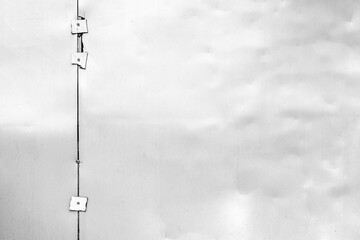 Abstract metallic surface with rivets and textures in black and white