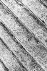 Weathered concrete texture with diagonal lines and surface details