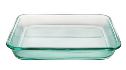 A clear glass baking dish with a slight green tint sitting on a black background in a studio shot on transparent background