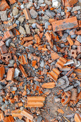Close-up of rubble and broken bricks with concrete fragments