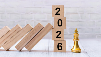 2026 Wooden Blocks Next to Gold King Chess Piece Symbolizing Leadership and Strategic Planning