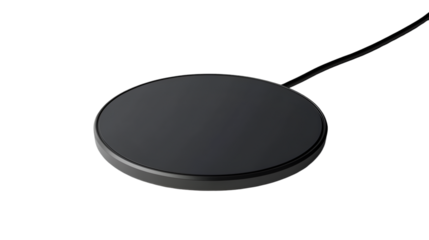 A minimalist view of a sleek black wireless charging pad on a dark background with a visible cable