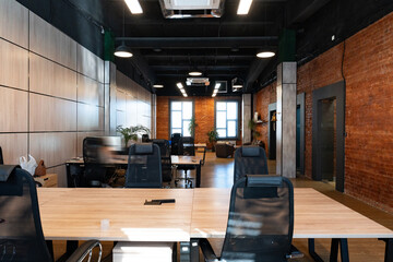 Modern office space with wooden interiors and a spacious layout located in a vibrant urban area