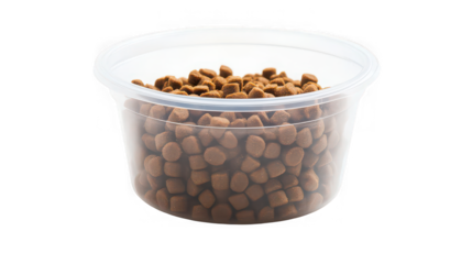 A clear plastic container filled with brown dry dog food pellets on a black background plain studio shot