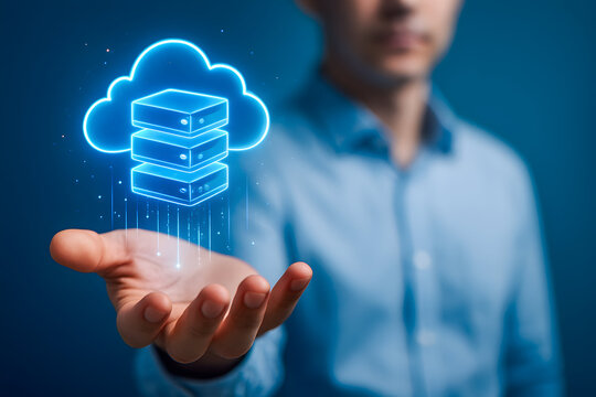 Businessman holding glowing cloud server icon for data storage and cloud computing