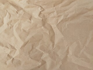 Obraz premium Abstract brown crumpled paper texture background 
