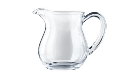 A clear glass pitcher with a curved handle and spout isolated against a black background in a studio shot on transparent background