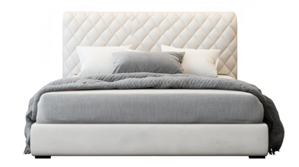 A modern. stylish bed with a plush quilted headboard. adorned with soft pillows and a cozy blanket. set against a neutral background. ideal for contemporary bedroom decor