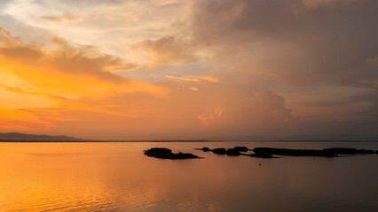 Obraz premium Scenic View of Lake During Golden Hour