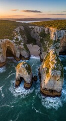 Coastal Grandeur: Majestic Cliffs and Arches Meet the Turquoise Sea at Sunset