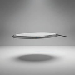 Sleek and futuristic wireless charging pad levitating in mid-air against a clean gray studio background, showcasing modern technology and minimalist design for smart devices