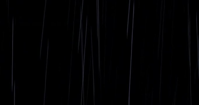 Heavy rain pours against a black background with close-up droplets splashing on impact. A seamless, loopable practical VFX element perfect for storm atmospheres, dramatic scenes and cinematic overlays