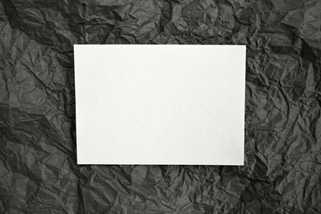 Design background with a sheet of white paper. Color of the Year 2026, Cloud Dancer.