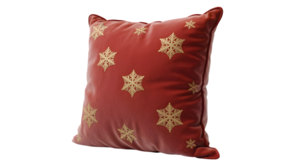 Luxurious red velvet cushion with intricate gold embroidered royal crests on a black background