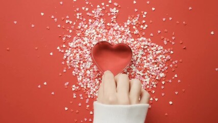 Abstract video heart with red background - Powered by Adobe