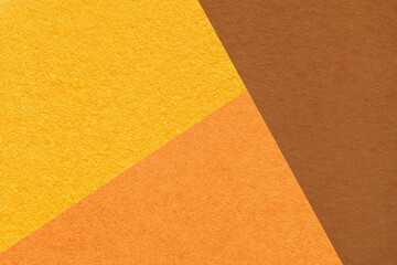 Geometric yellow, brown and orange texture paper background for presentation, banner, template with copy space