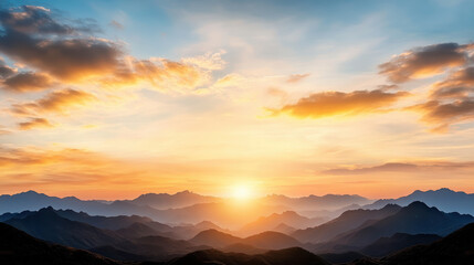 Sunrise mountain sky warm light calm horizon glowing clouds