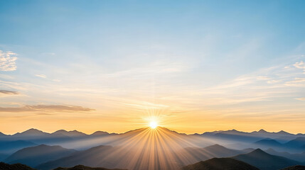Sunrise mountain sunburst over layered misty peaks, serene glow and warm sky