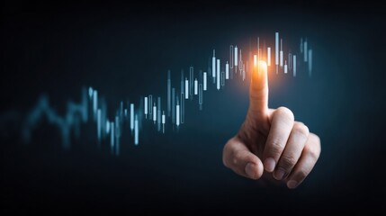 Hand touching a glowing stock market graph