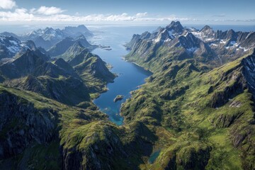Obraz premium Breathtaking aerial view of Flakstadoya mountains revealing stunning landscapes of Lofoten Islands with lush greenery and serene waterway at midday