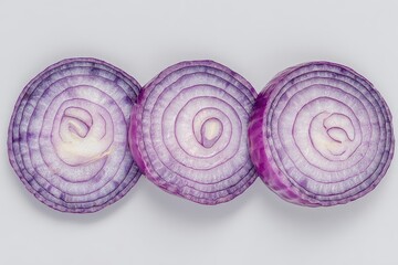 Three Sliced Red Onions on White Background with Overhead Lighting