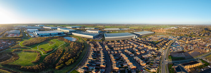 Panorama of housing estates adjacent to warehouses of a distribution centre, Warrington, England