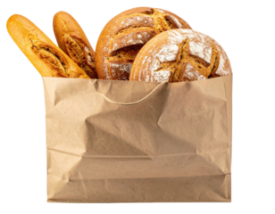 Bread varieties piled in a simple paper bag
