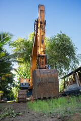 excavator at work site front view