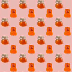 Continuous pattern of pumpkin and pumpkin orange marmalade jar on pink background