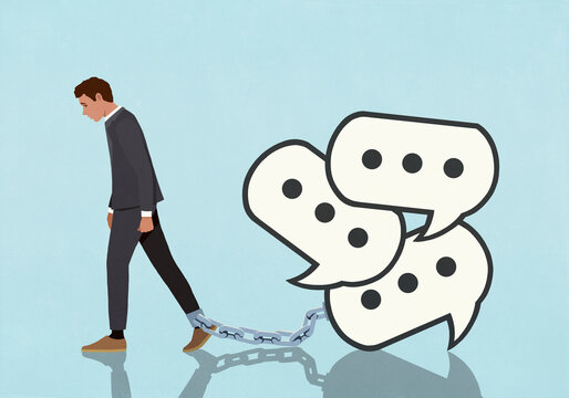 Text message speech bubbles shackled to man's ankle against blue background
