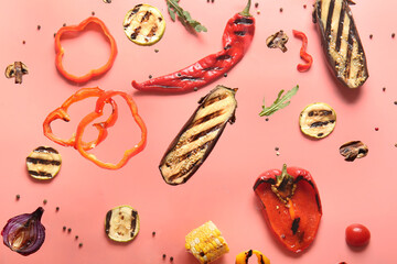 Different tasty grilled vegetables flying on red background