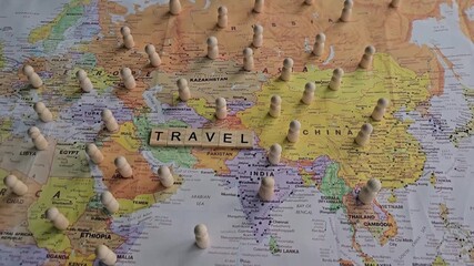 Exploring travel destinations on a map with markers in Asia and other regions