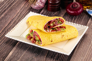 Burrito with tuna and vegetables wrap