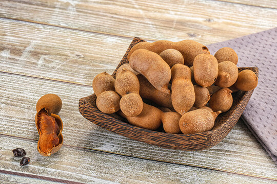 Tropical exotic Tamarind fruit heap