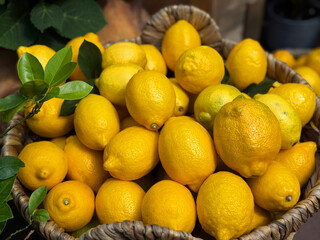 Lemons fruits in the basket.