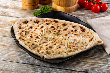 Turkish Kutab staffed green herbs