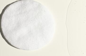 A cotton pad for removing makeup and micellar water. © mitand73